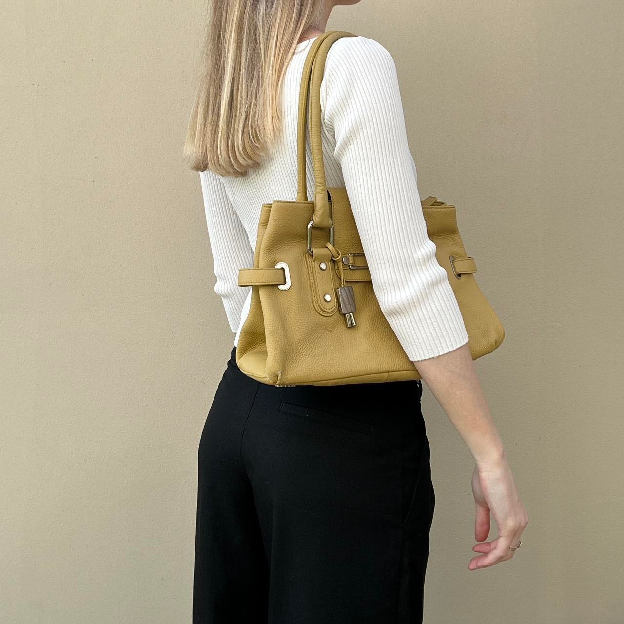 Vintage yellow leather handbag