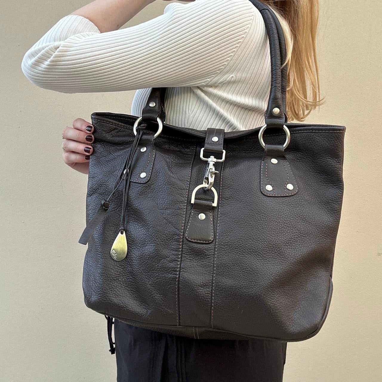 Vintage brown leather bag with silver hardware detail