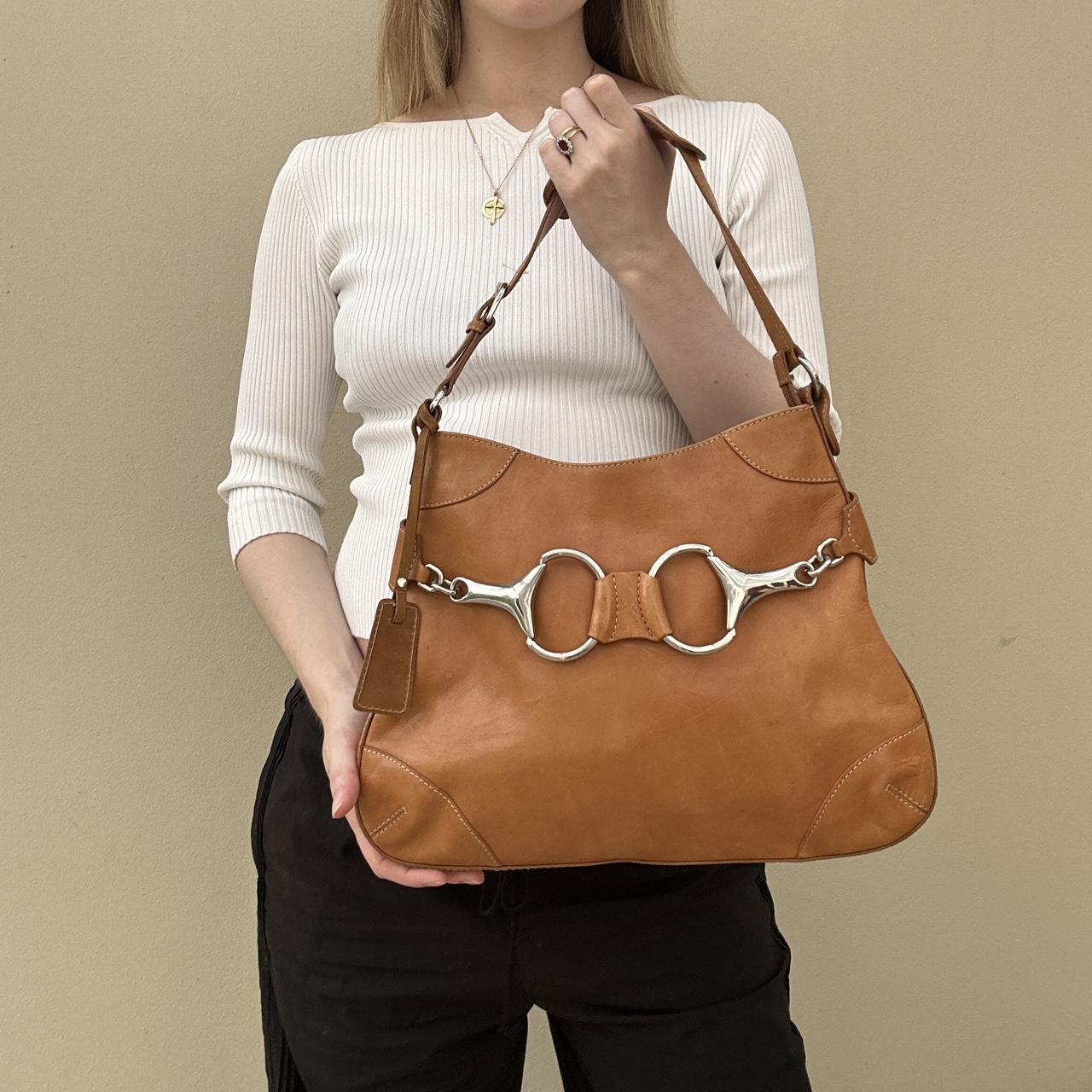 Tan vintage horse bit bag