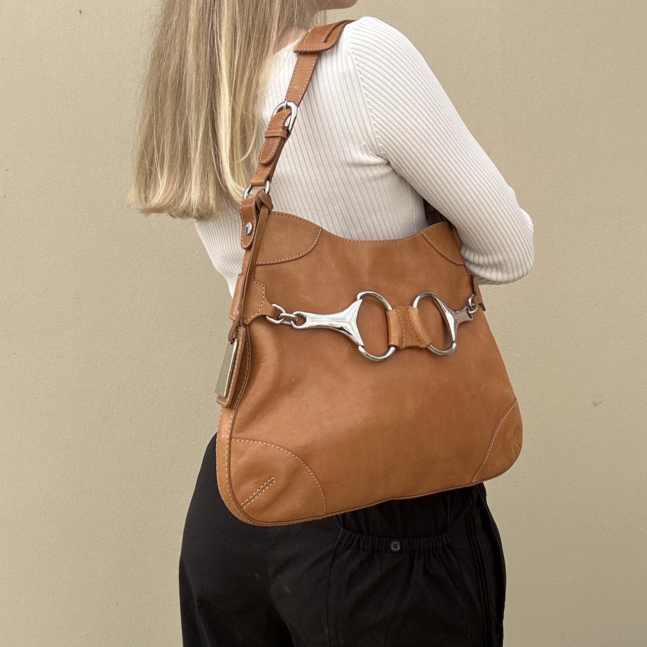 Tan vintage horse bit bag