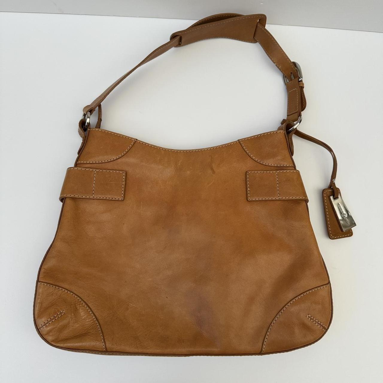 Tan vintage horse bit bag