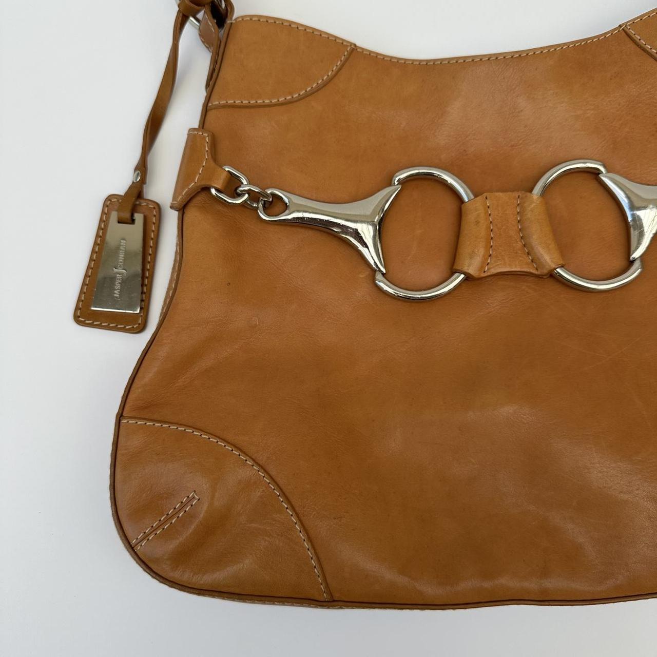 Tan vintage horse bit bag