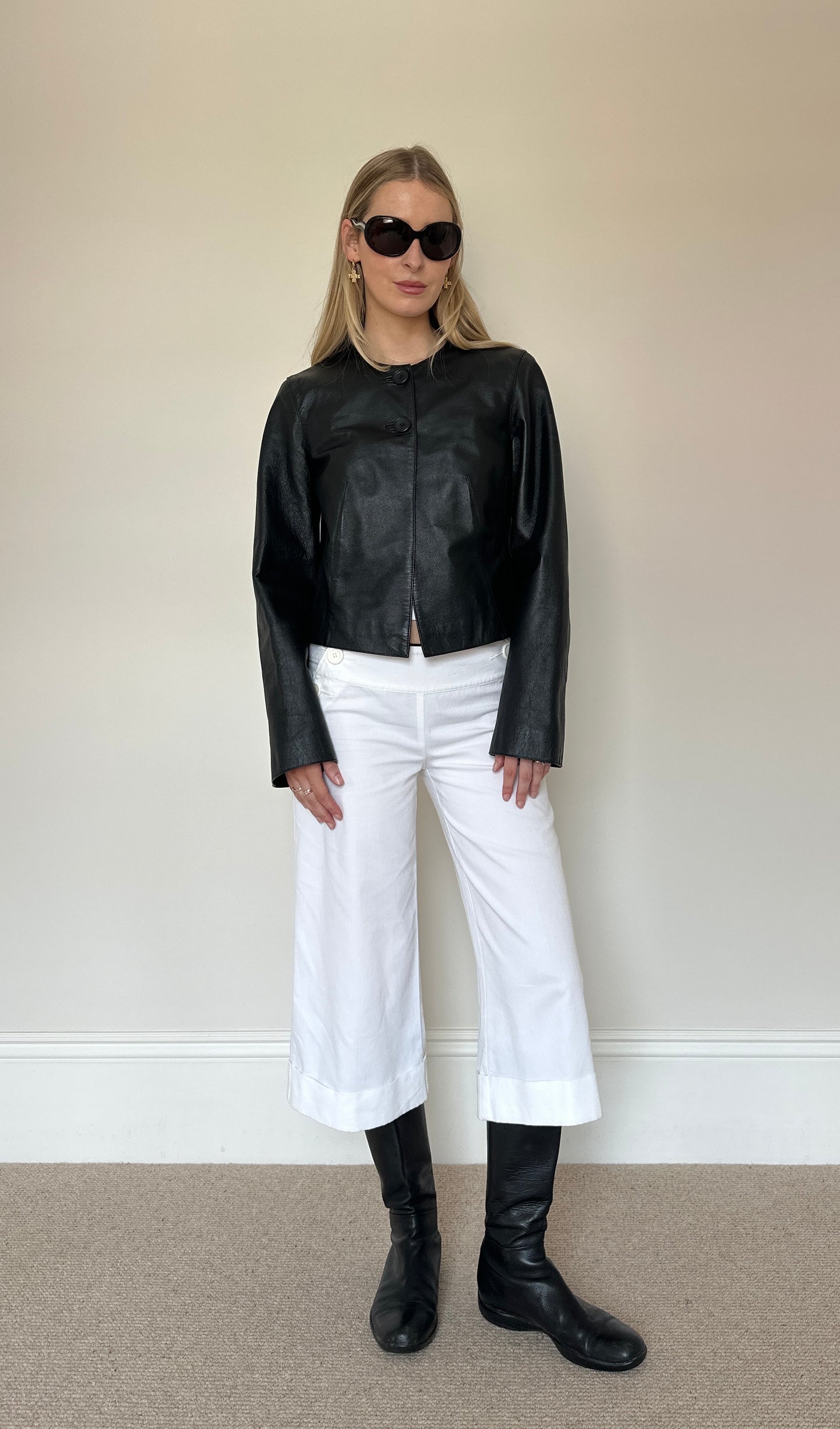 Vintage black collarless leather jacket