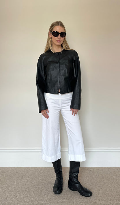Vintage black collarless leather jacket