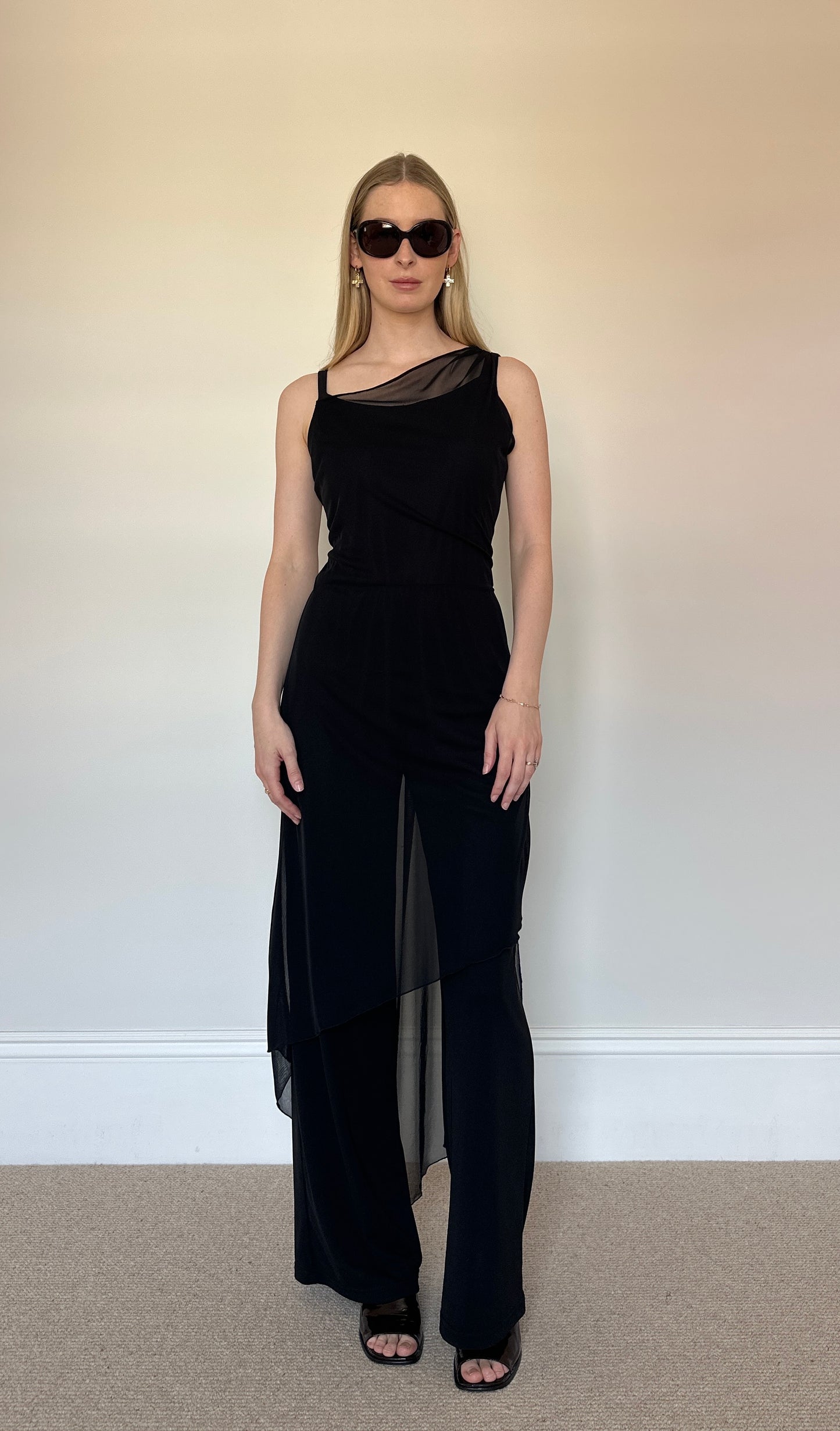 Black jumpsuit with sheer layer