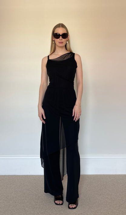 Black jumpsuit with sheer layer