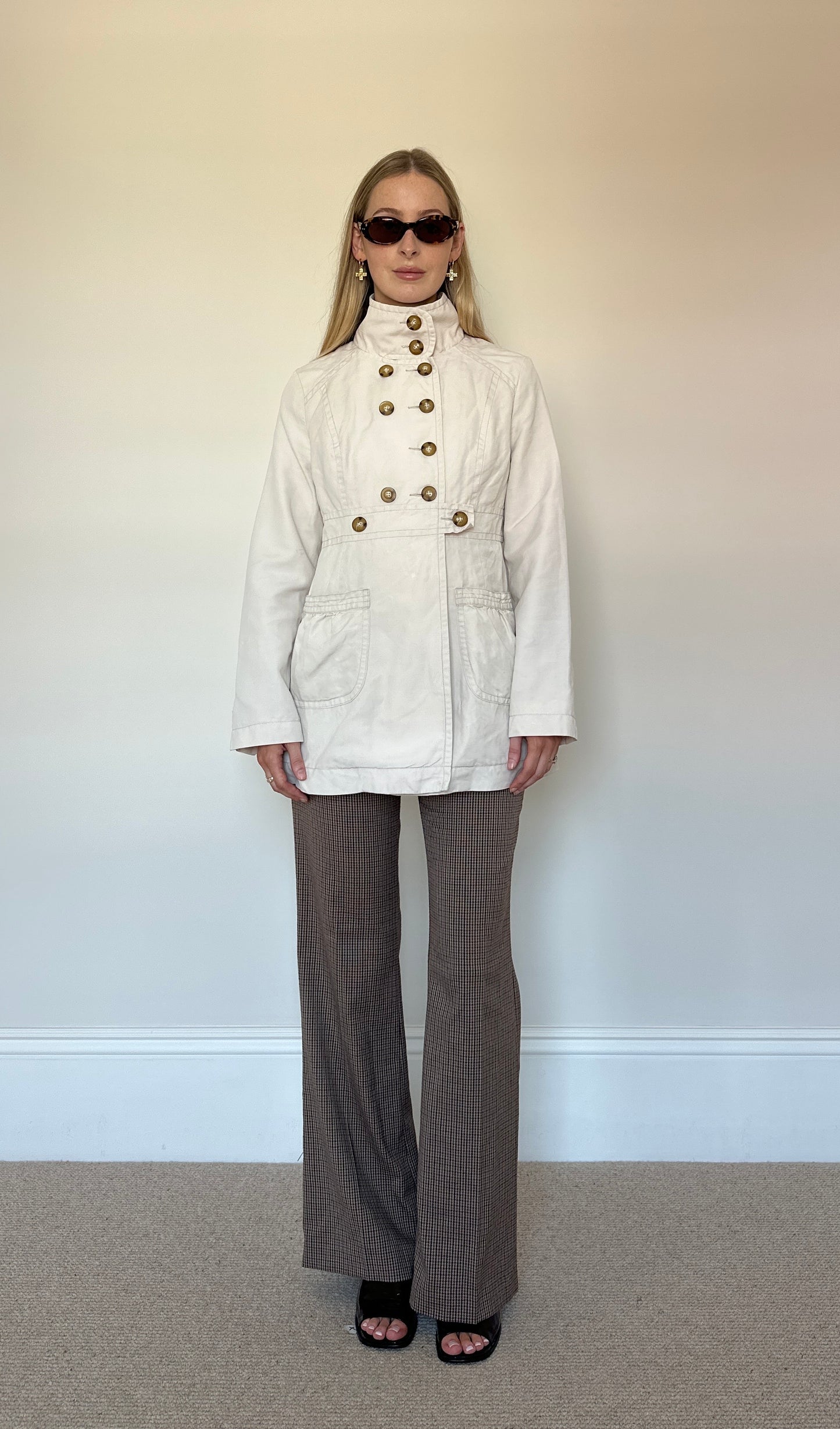 Beige button up trench coat