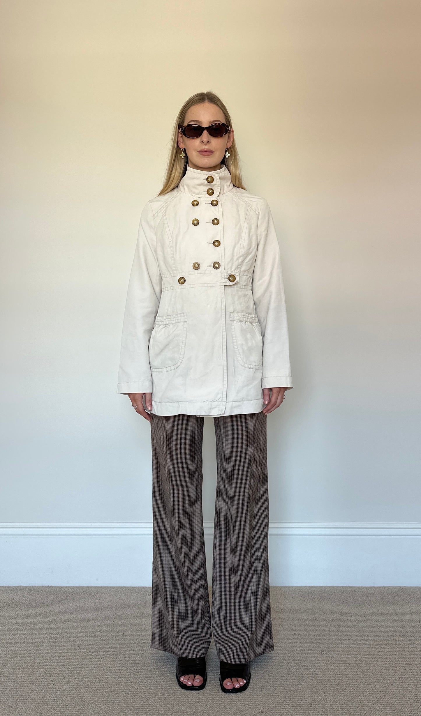 Beige button up trench coat