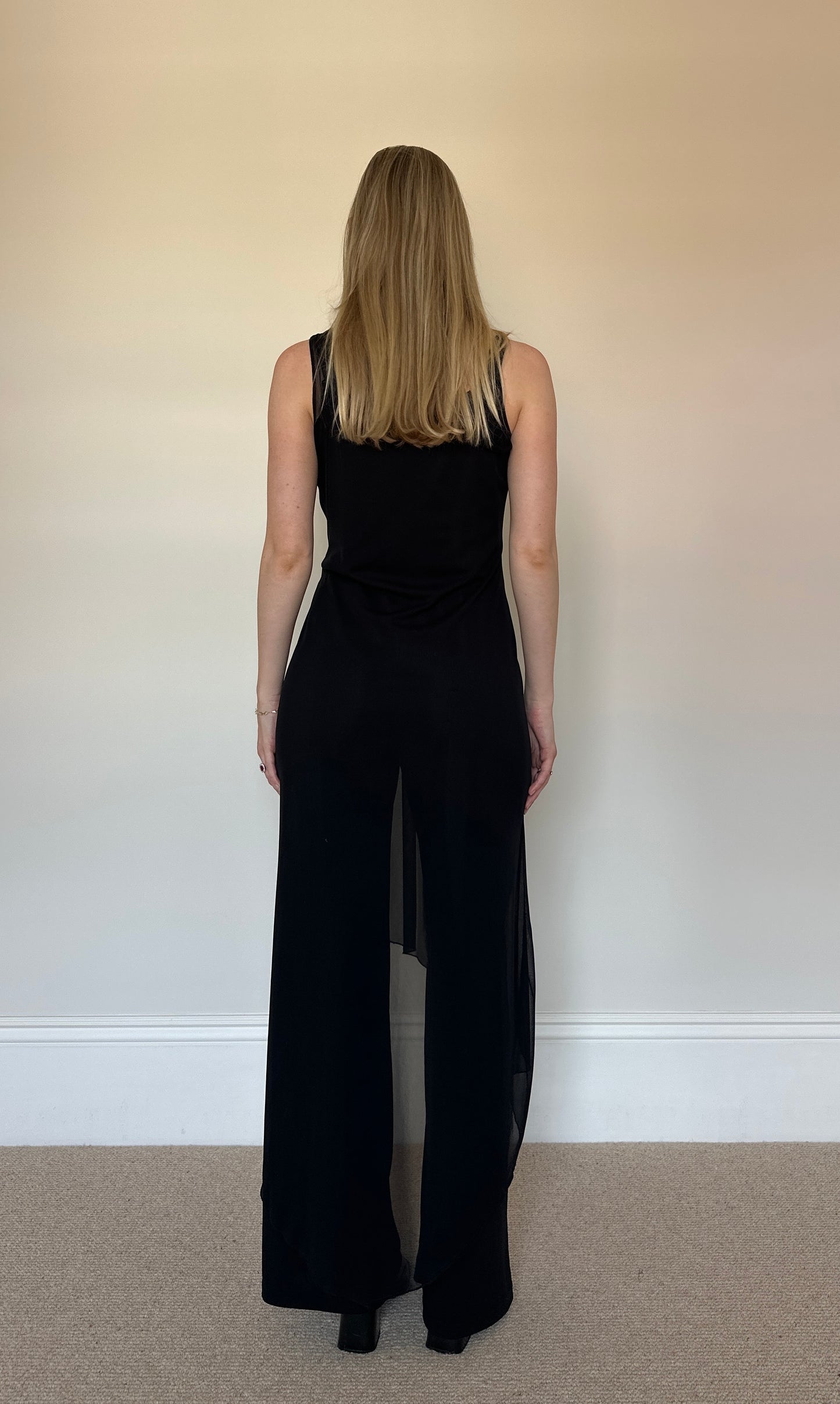 Black jumpsuit with sheer layer