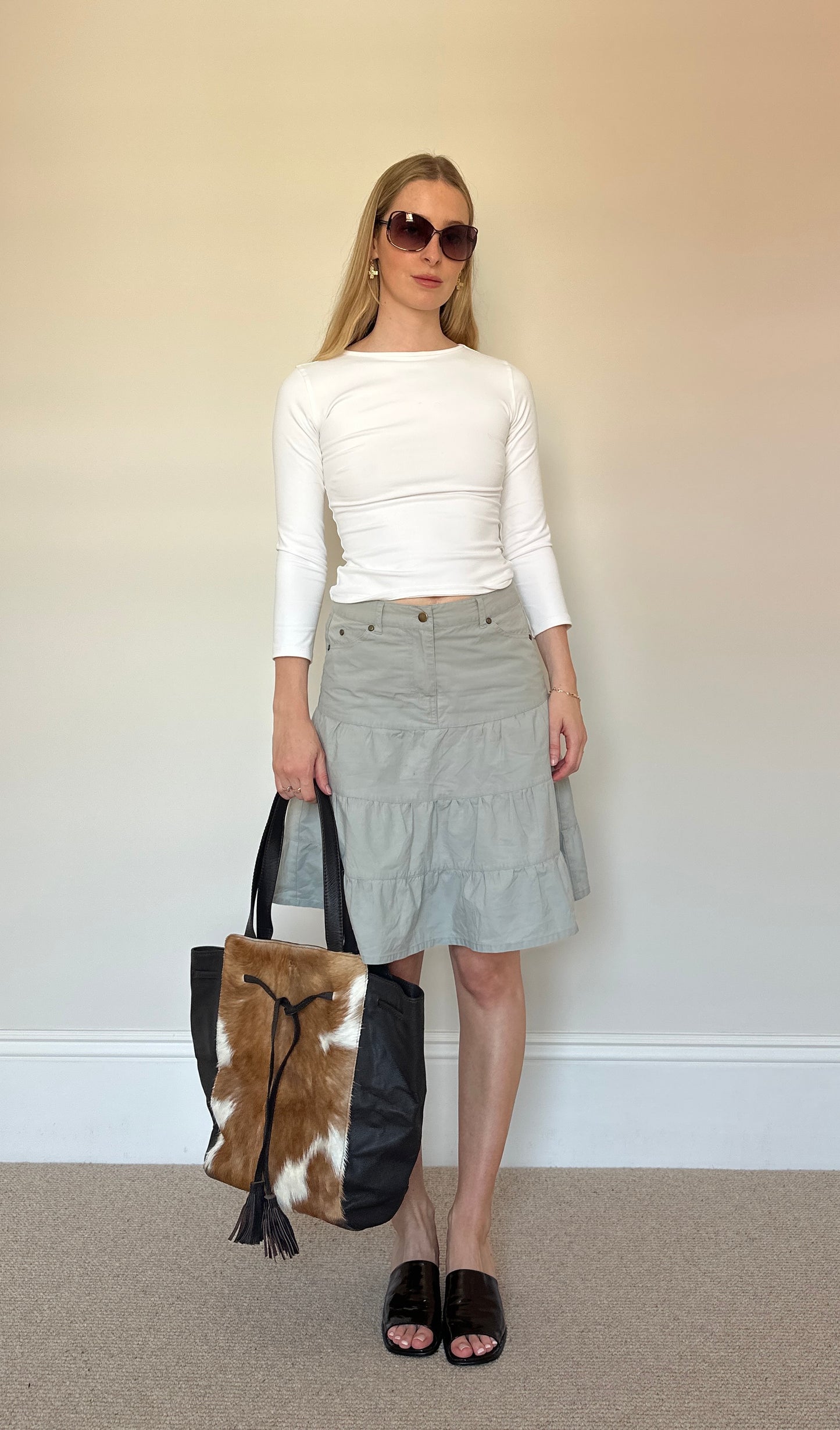 Cow hide tassle bag