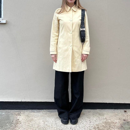 Vintage butter yellow pea trench coat