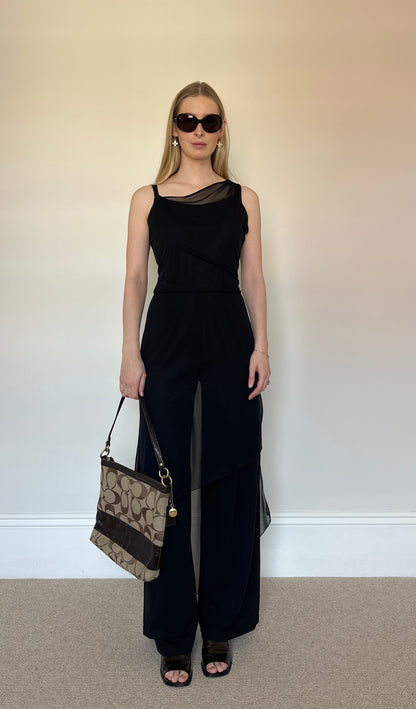 Black jumpsuit with sheer layer