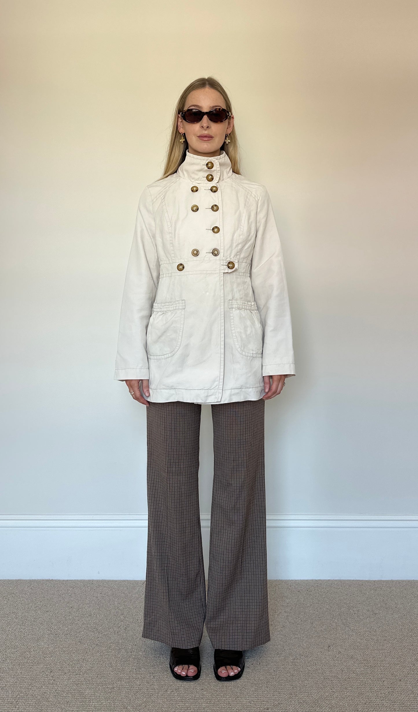 Beige button up trench coat