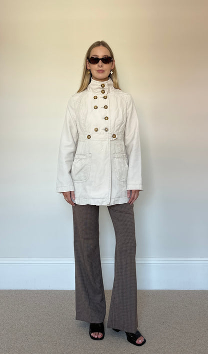 Beige button up trench coat