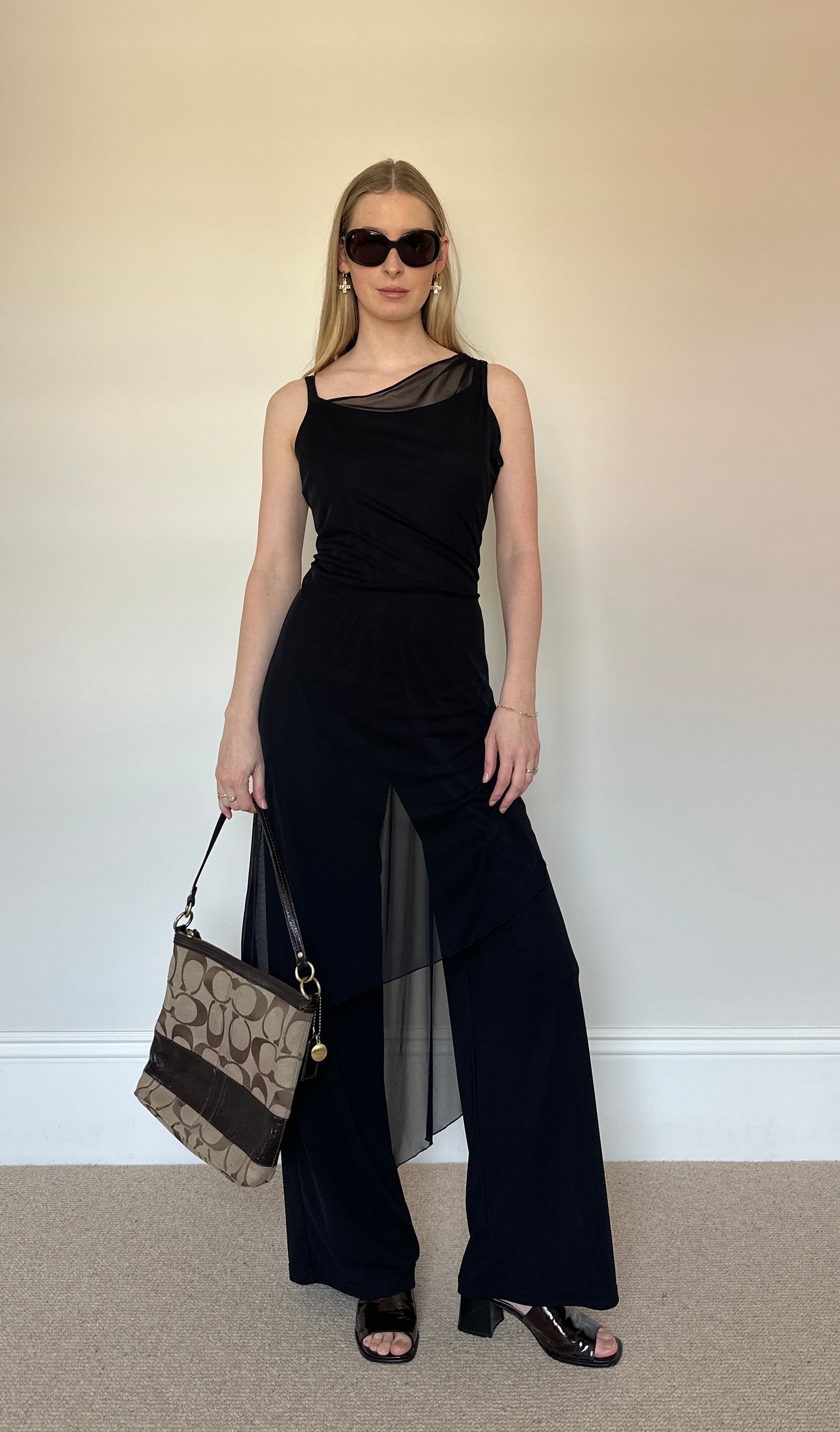Black jumpsuit with sheer layer