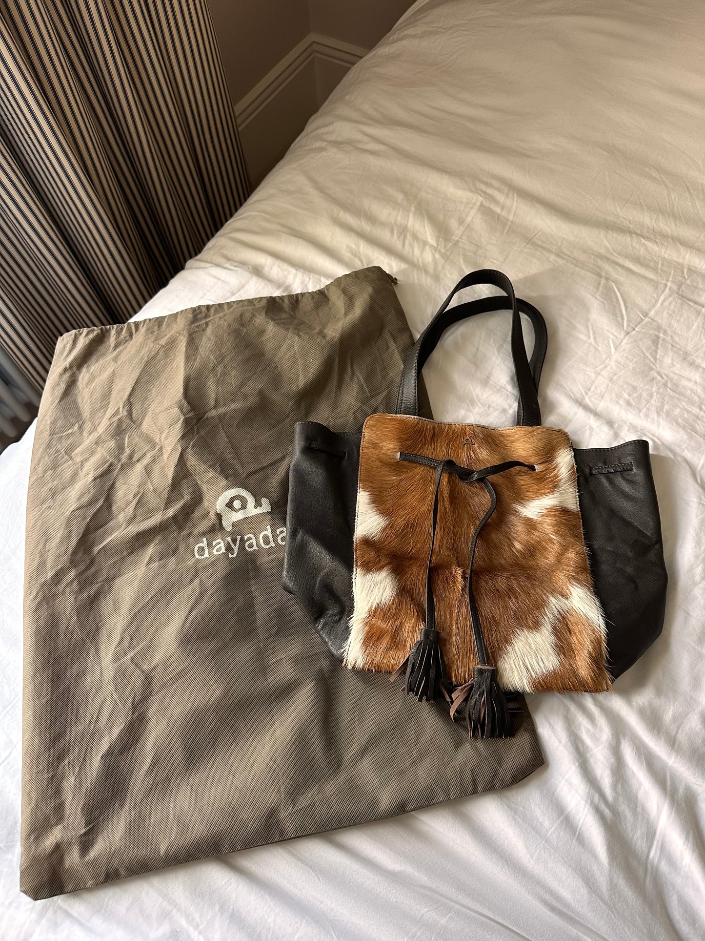 Cow hide tassle bag