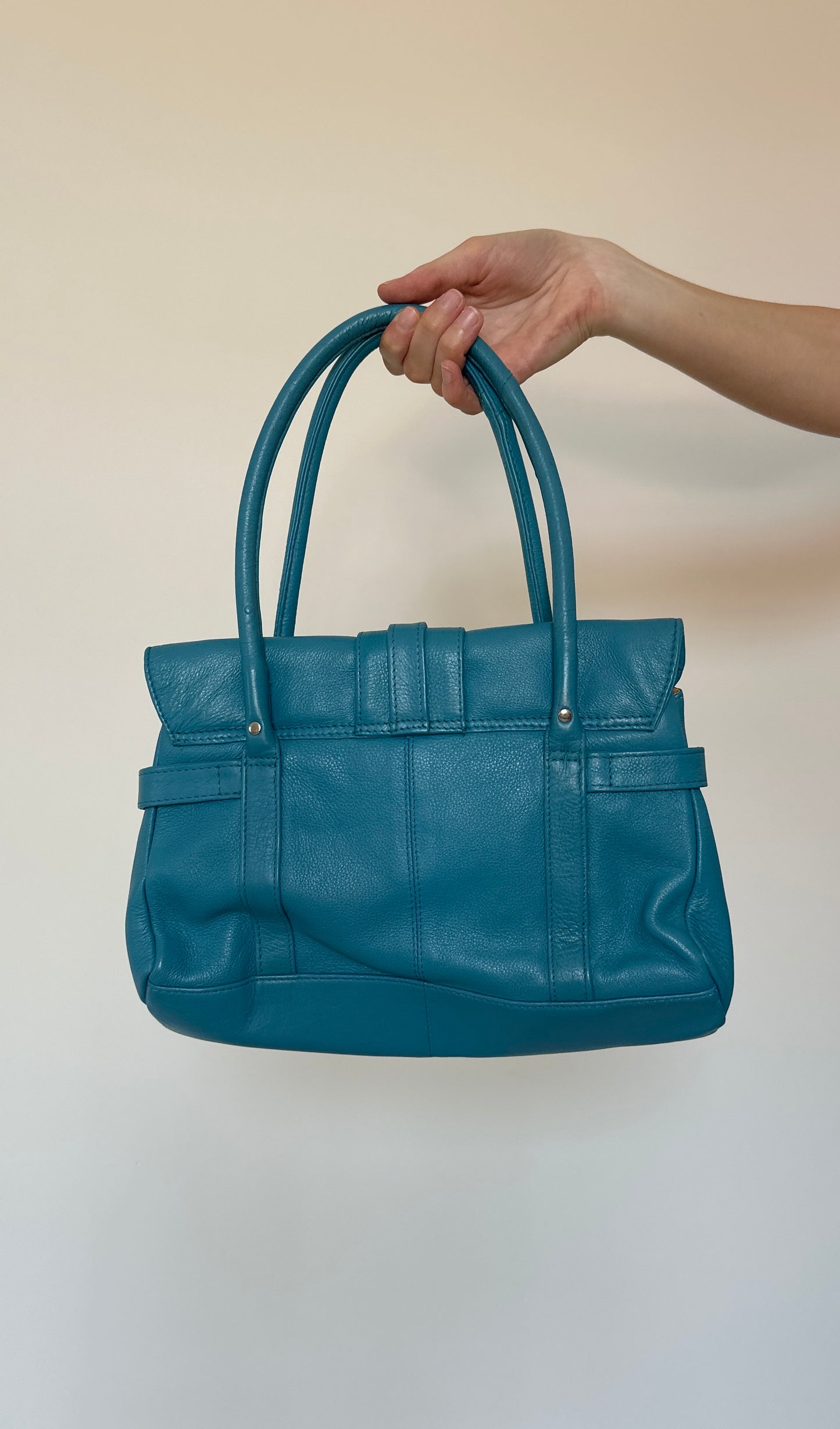 Vintage turquoise leather bag