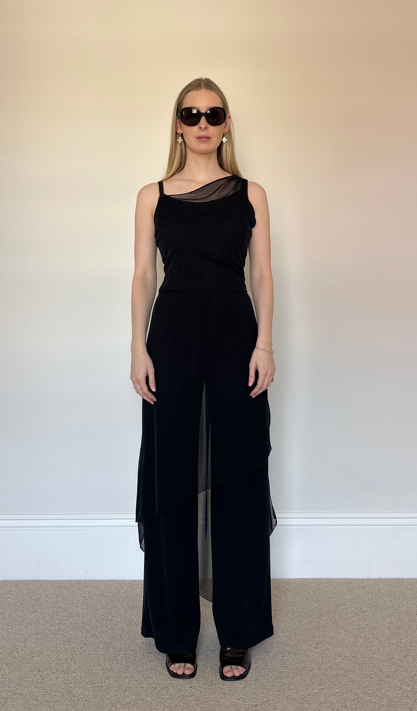 Black jumpsuit with sheer layer