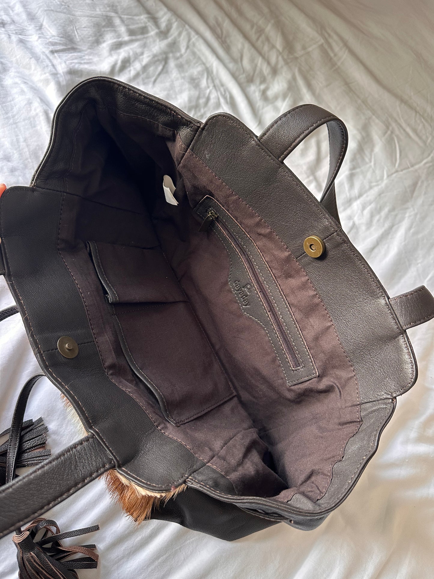 Cow hide tassle bag