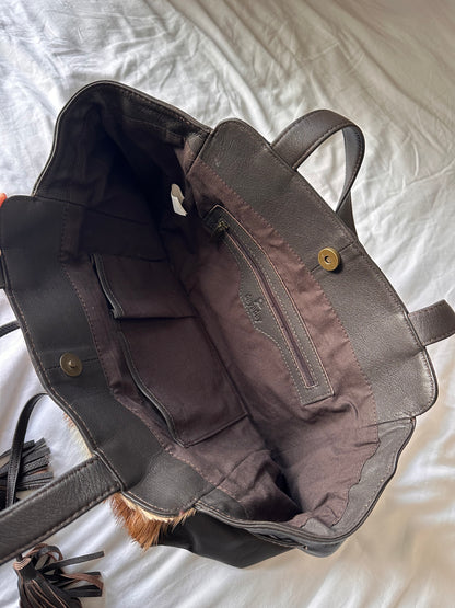Cow hide tassle bag