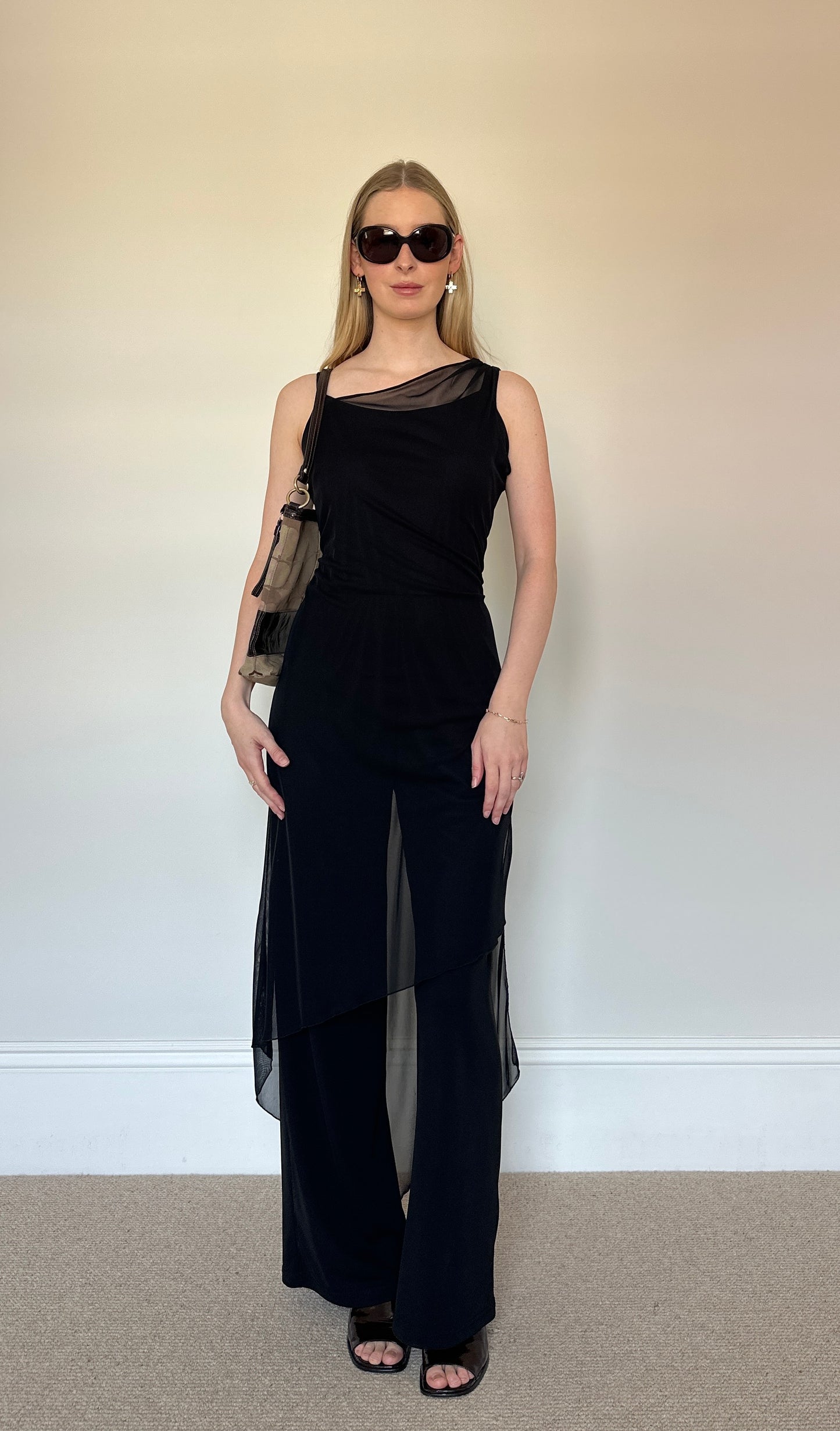 Black jumpsuit with sheer layer