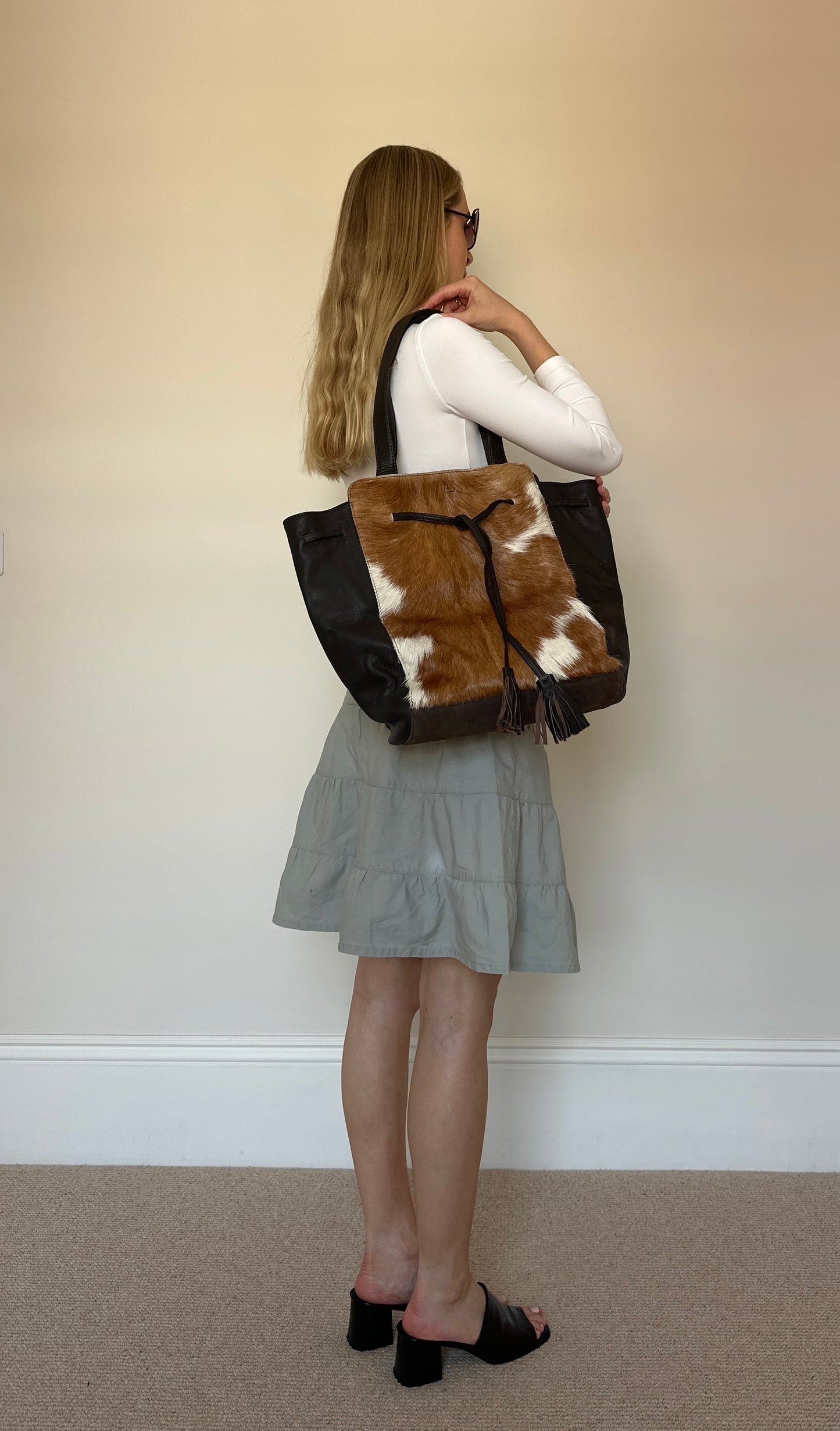 Cow hide tassle bag