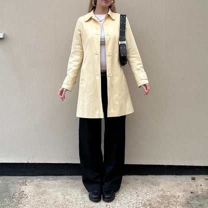 Vintage butter yellow pea trench coat