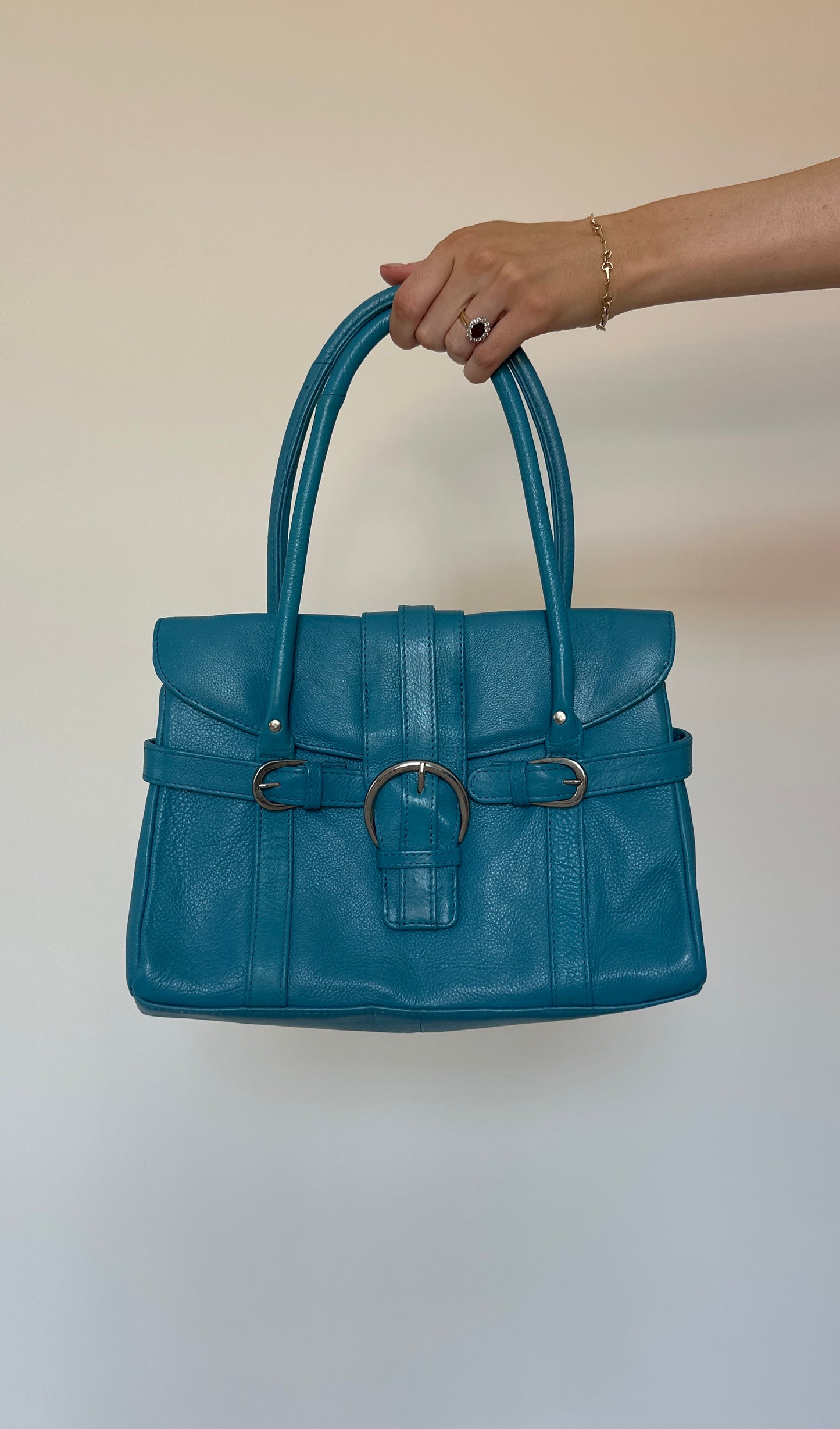 Vintage turquoise leather bag