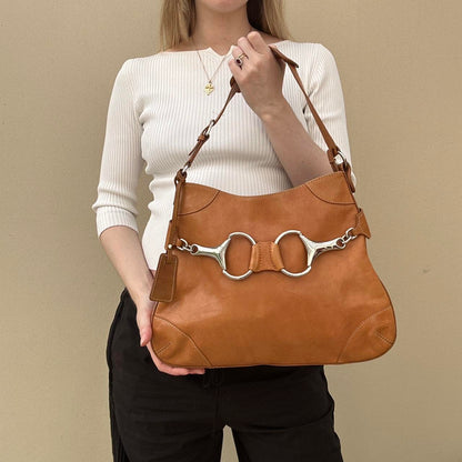 Tan vintage horse bit bag