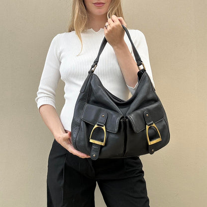 Vintage leather bag with gold horse stirrups detail