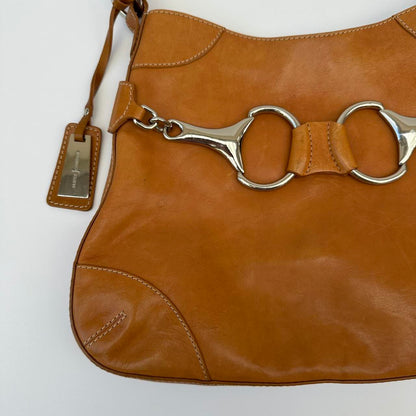 Tan vintage horse bit bag