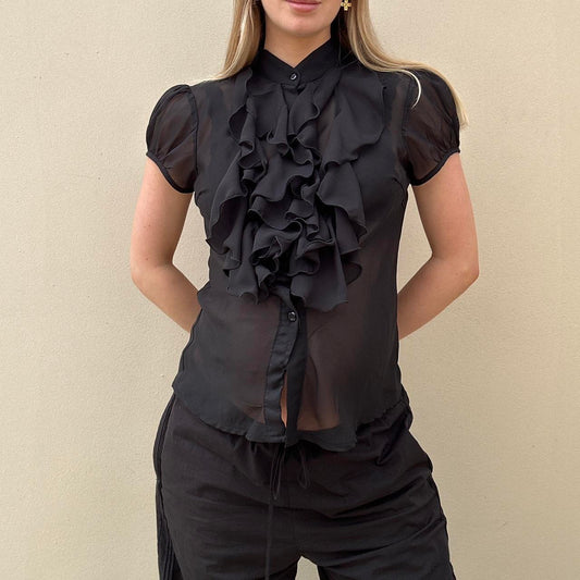Black ruffled blouse